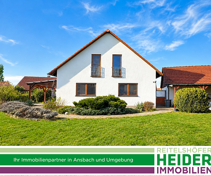 Einfamilienhaus mit Einliegerwohnung, in sonniger Lage