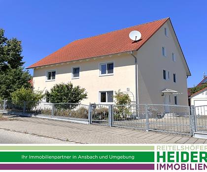 Gepflegtes Zweifamilienhaus mit großen 4-Zimmer-Wohnungen am Stadtrand